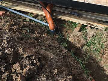 Вывод канализационной трубы из дома в Жилёво